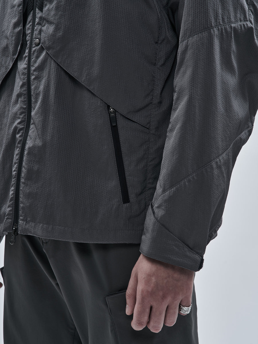 Zipped side pocket and adjustable cuff