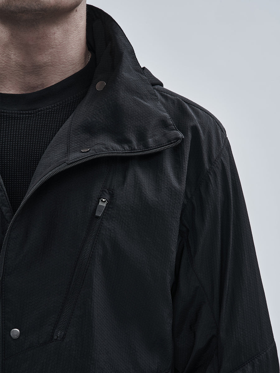 Asymmetrical collar and chest pocket